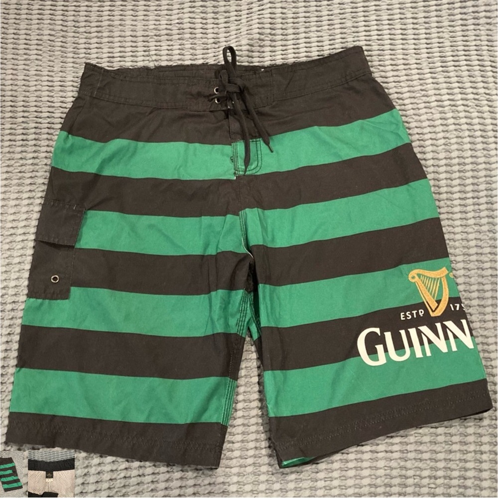 Guinness Board shorts. Worn once. Mesh lining.perfect for any Guinness fan.